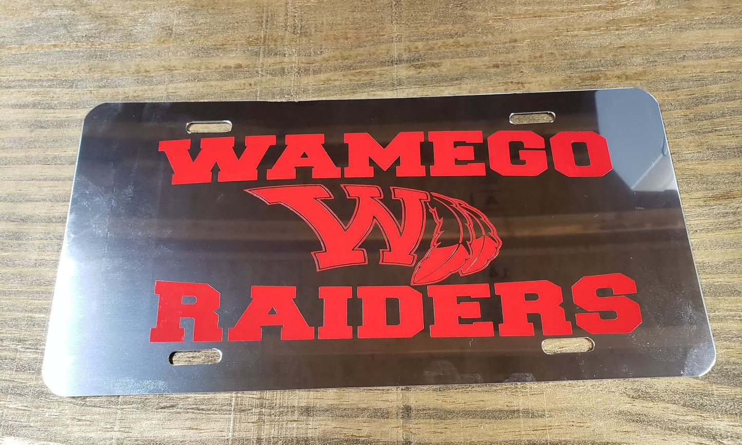 Wamego Raiders in Red Plain on a Silver Metal License Plate